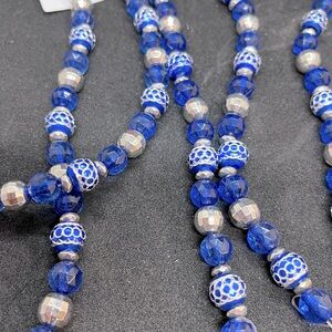 8 Strands of gorgeous sapphire blue beads.  Each strand has 29 pieces.